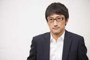  画期的な論文をまとめた野澤氏（筆者撮影）